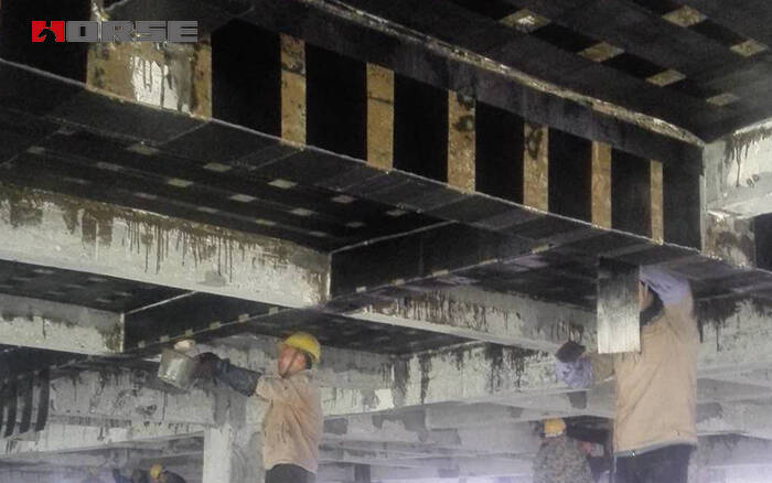 Carbon fiber retrofitting of concrete beams and slabs Carbon fiber retrofitting of concrete beams and slabs