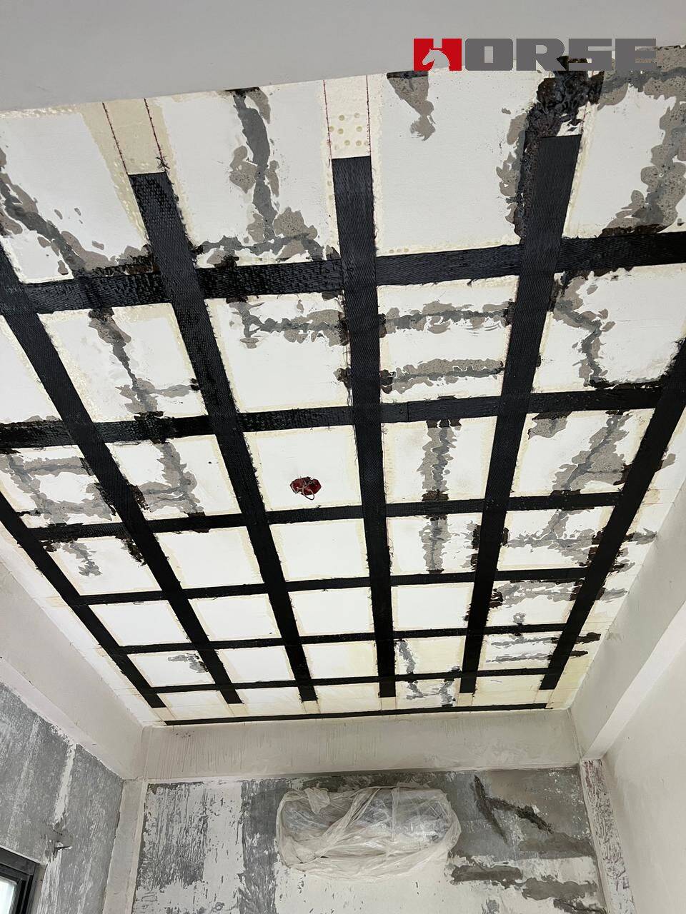 Repair Cracks on Concrete Floor Slab with Crack Injection and Carbon Fiber Sheet Repair Cracks on Concrete Floor Slab with Crack Injection and Carbon Fiber Sheet