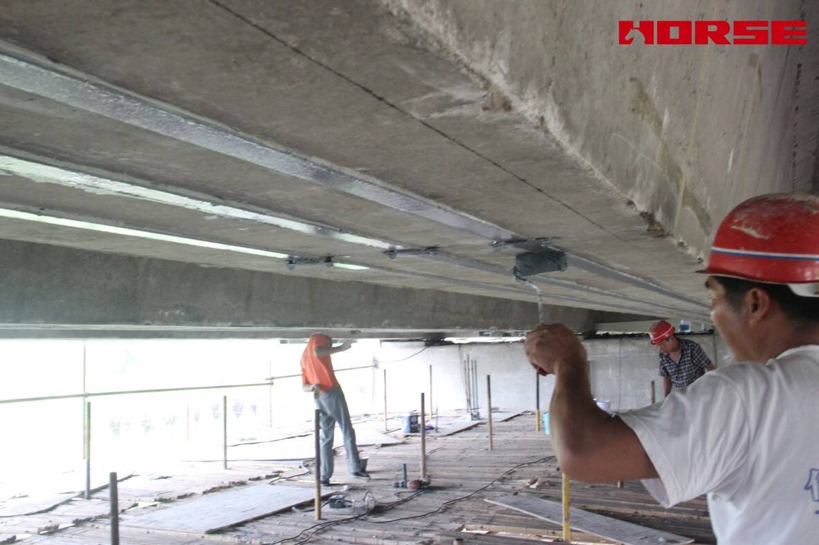 Pre-stress Carbon Fiber Laminates "Lock" Concrete Cracks